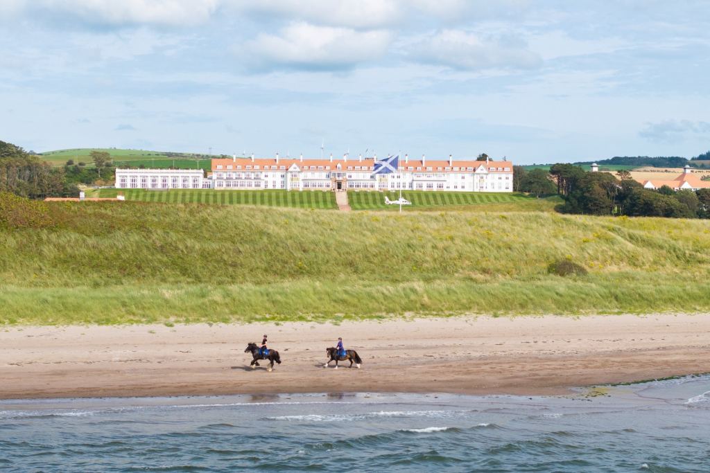 Horse riding on the beach below the resort