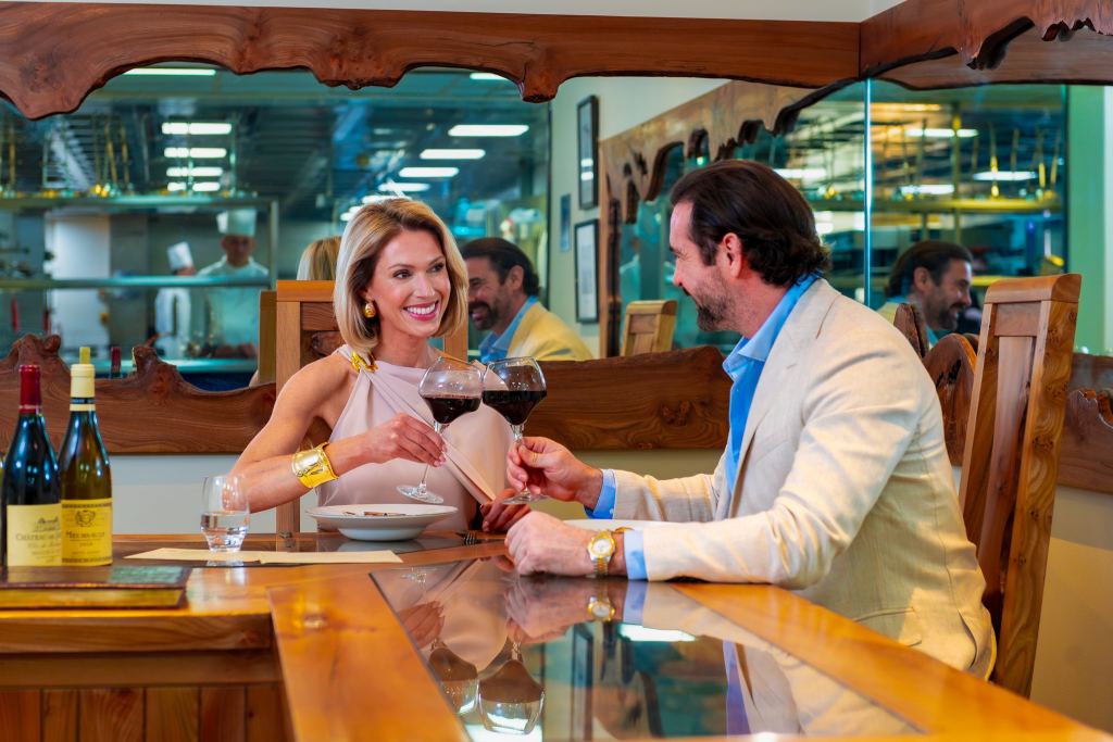Guests raising a toast at dinner