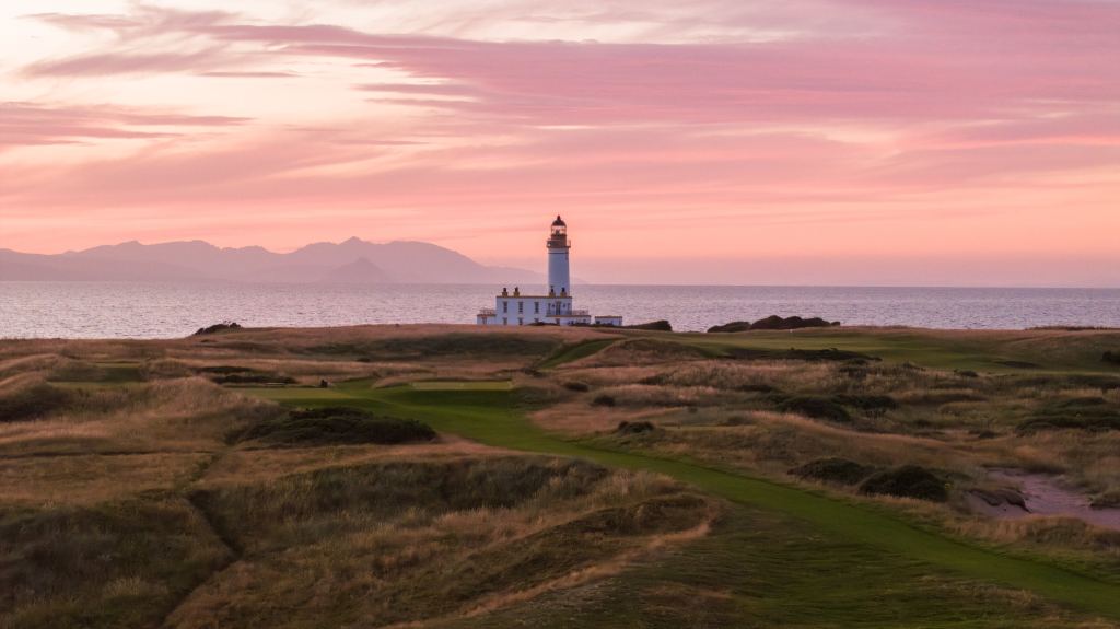 The Turnberry lighthouse at dusk across the links