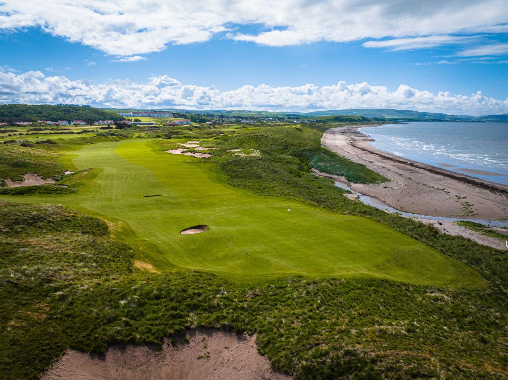 A links fairway running beside the bay