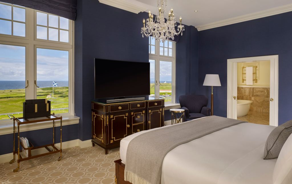 A deluxe bedroom with views over the links and sea